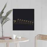 "Black and white illustration of bass clef with scale of 8 notes on stave" Canvas Wall Art