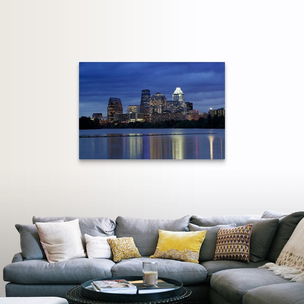 "Buildings at the waterfront lit up at dusk, Town Lake, Austin, Texas" Canvas Wall Art
