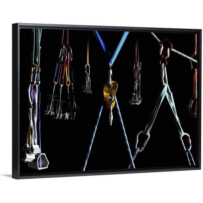 "Climbing equipment on black background" Black Float Frame Canvas Art