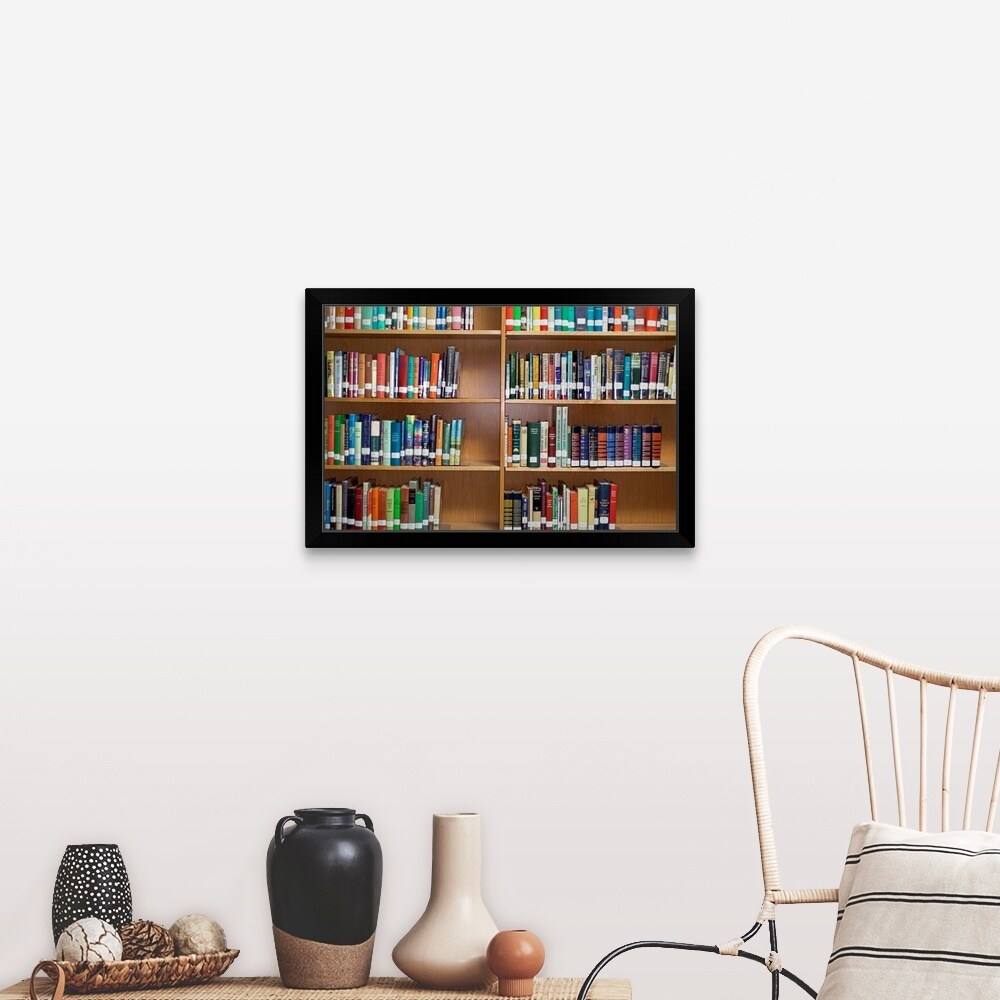 "Library bookshelves" Black Framed Print