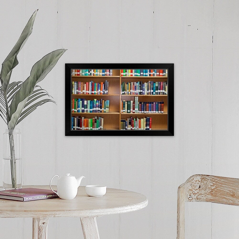 "Library bookshelves" Black Framed Print
