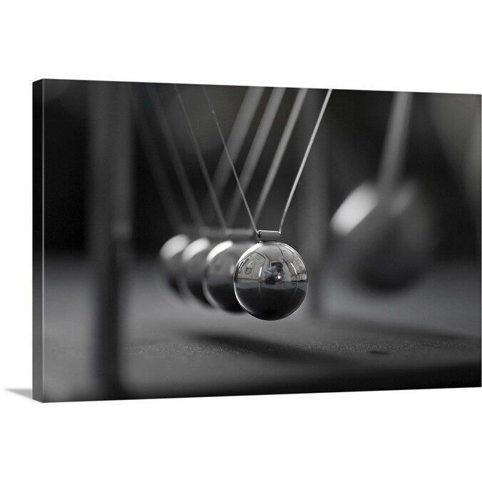 "Newton's Cradle in Motion" Canvas Wall Art