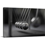"Newton's Cradle in Motion" Canvas Wall Art