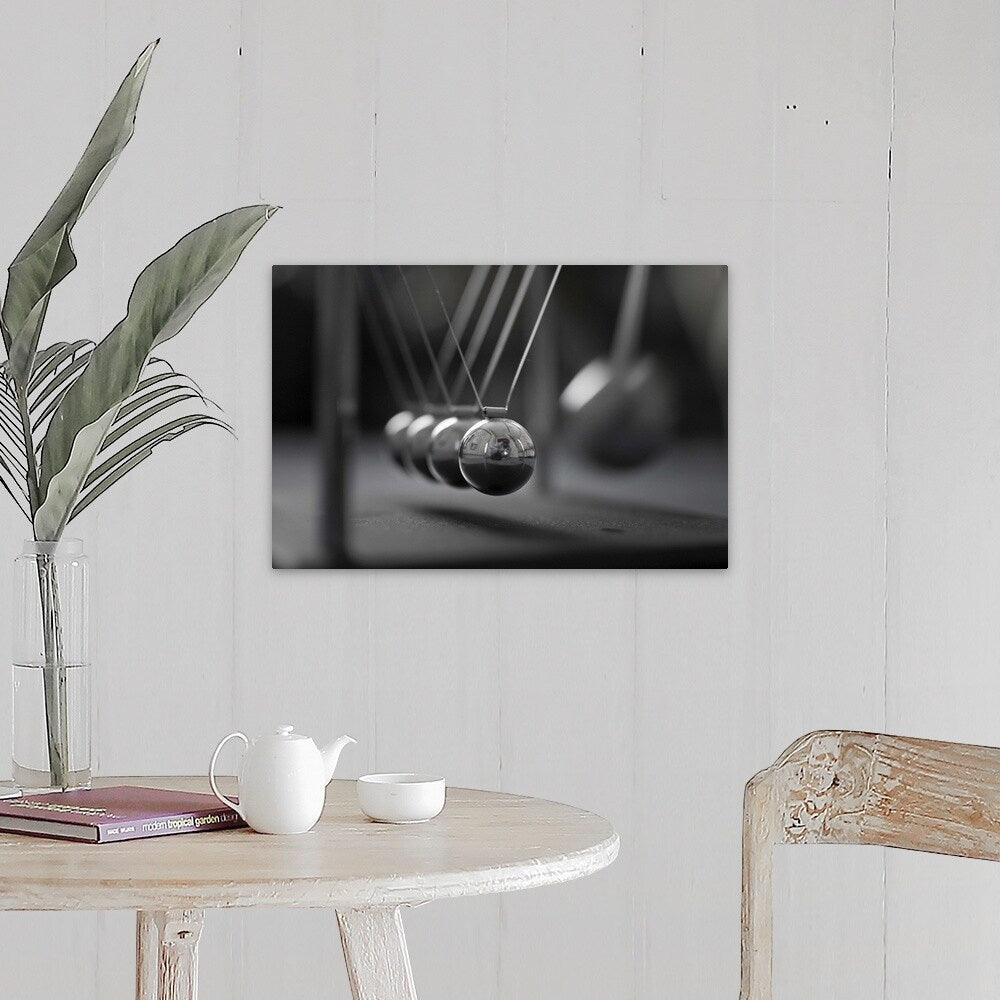 "Newton's Cradle in Motion" Canvas Wall Art