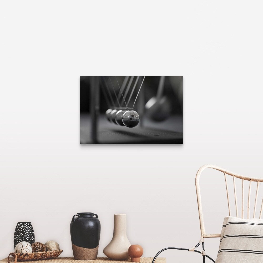 "Newton's Cradle in Motion" Canvas Wall Art