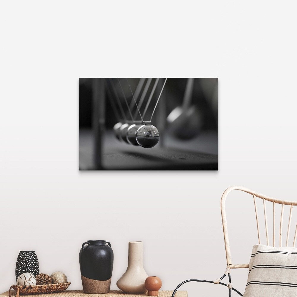 "Newton's Cradle in Motion" Canvas Wall Art