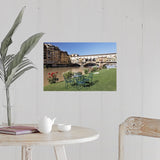 "Ponte Vecchio and table along Arno River" Poster Print - Multi