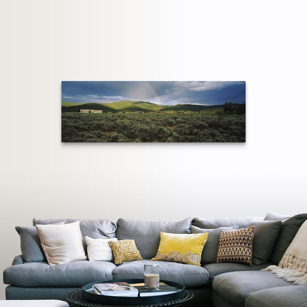 "Rainbow over a rolling landscape, Taos, New Mexico" Canvas Wall Art