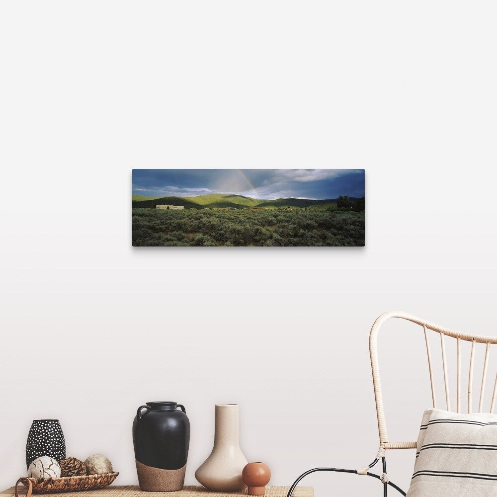 "Rainbow over a rolling landscape, Taos, New Mexico" Canvas Wall Art