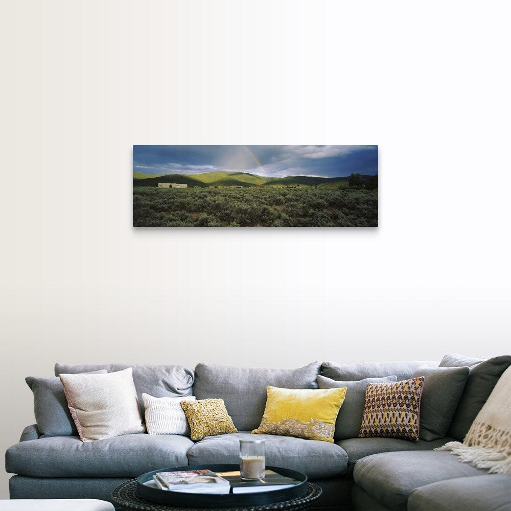 "Rainbow over a rolling landscape, Taos, New Mexico" Canvas Wall Art