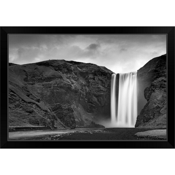 "Skogafoss waterfall plunges over old sea cliffs on south coast of Iceland." Black Framed Print