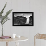 "Skogafoss waterfall plunges over old sea cliffs on south coast of Iceland." Black Framed Print