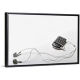 "Studio shot of mp3 player and earphones" Black Float Frame Canvas Art