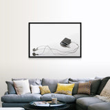 "Studio shot of mp3 player and earphones" Black Float Frame Canvas Art