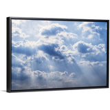 "Sun rays beaming through the clouds" Black Float Frame Canvas Art