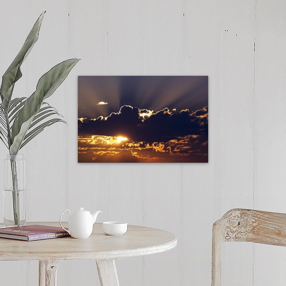 "Sun rising behind dark clouds, Montana" Canvas Wall Art