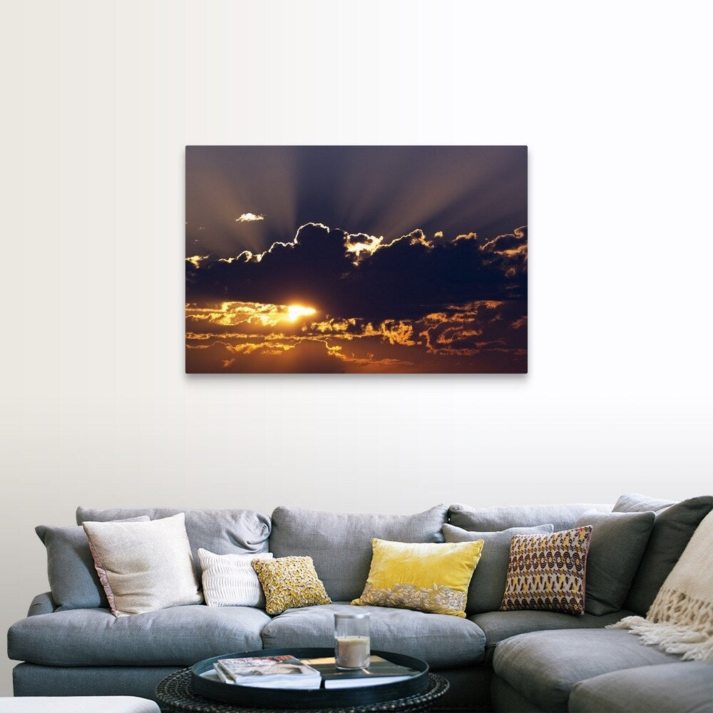 "Sun rising behind dark clouds, Montana" Canvas Wall Art