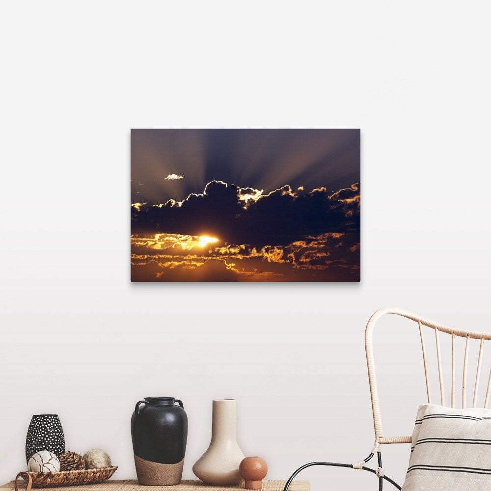 "Sun rising behind dark clouds, Montana" Canvas Wall Art