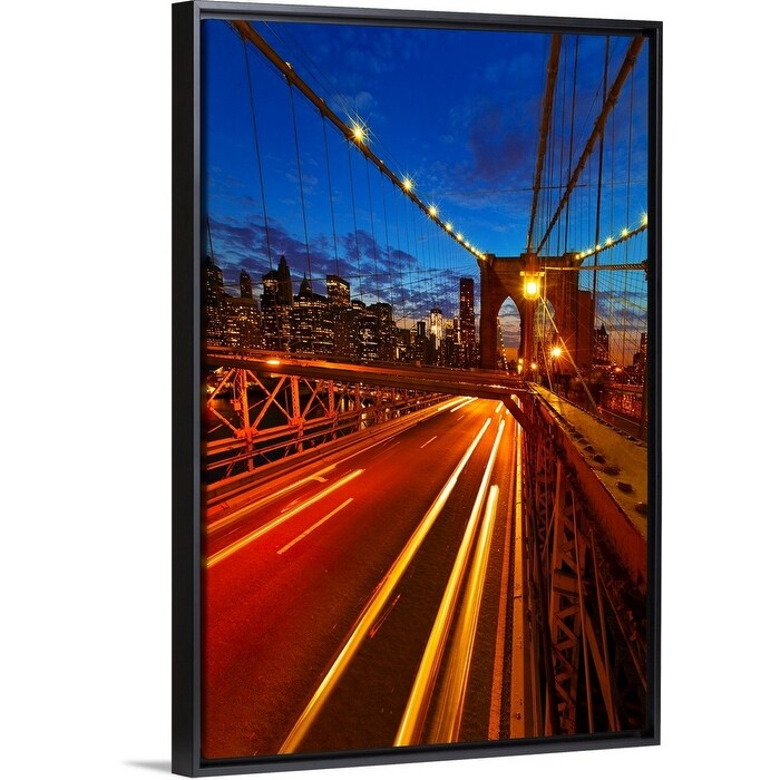 "USA, New York City, Brooklyn Bridge with light trails at dusk" Black Float Frame Canvas Art