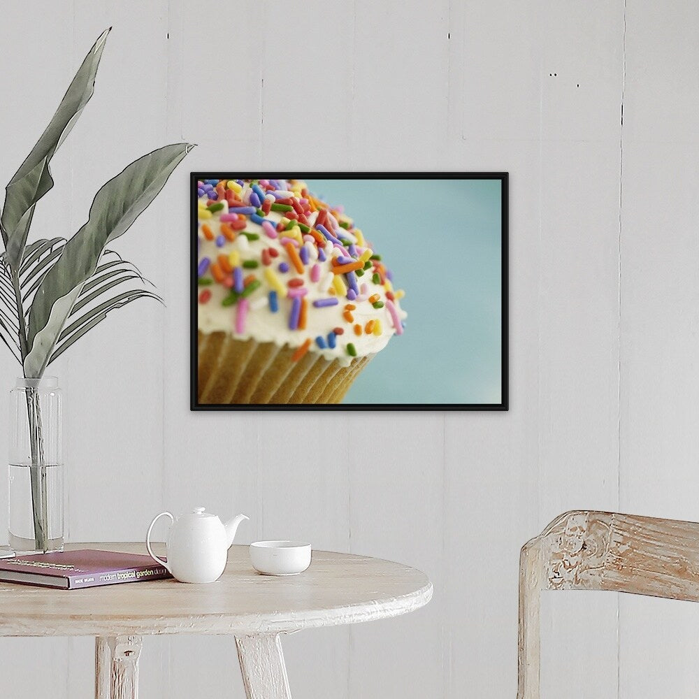 "Vanilla cupcake smothered with colorful sprinkles" Black Float Frame Canvas Art