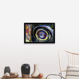 "Wheel of a half-buried Cadillac covered in graffiti, Cadillac Ranch Monument." Black Framed Print