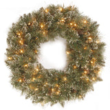 National Tree Company 30 in. Glittery Bristle Pine Wreath with White Tipped Cones and 50 Clear Lights