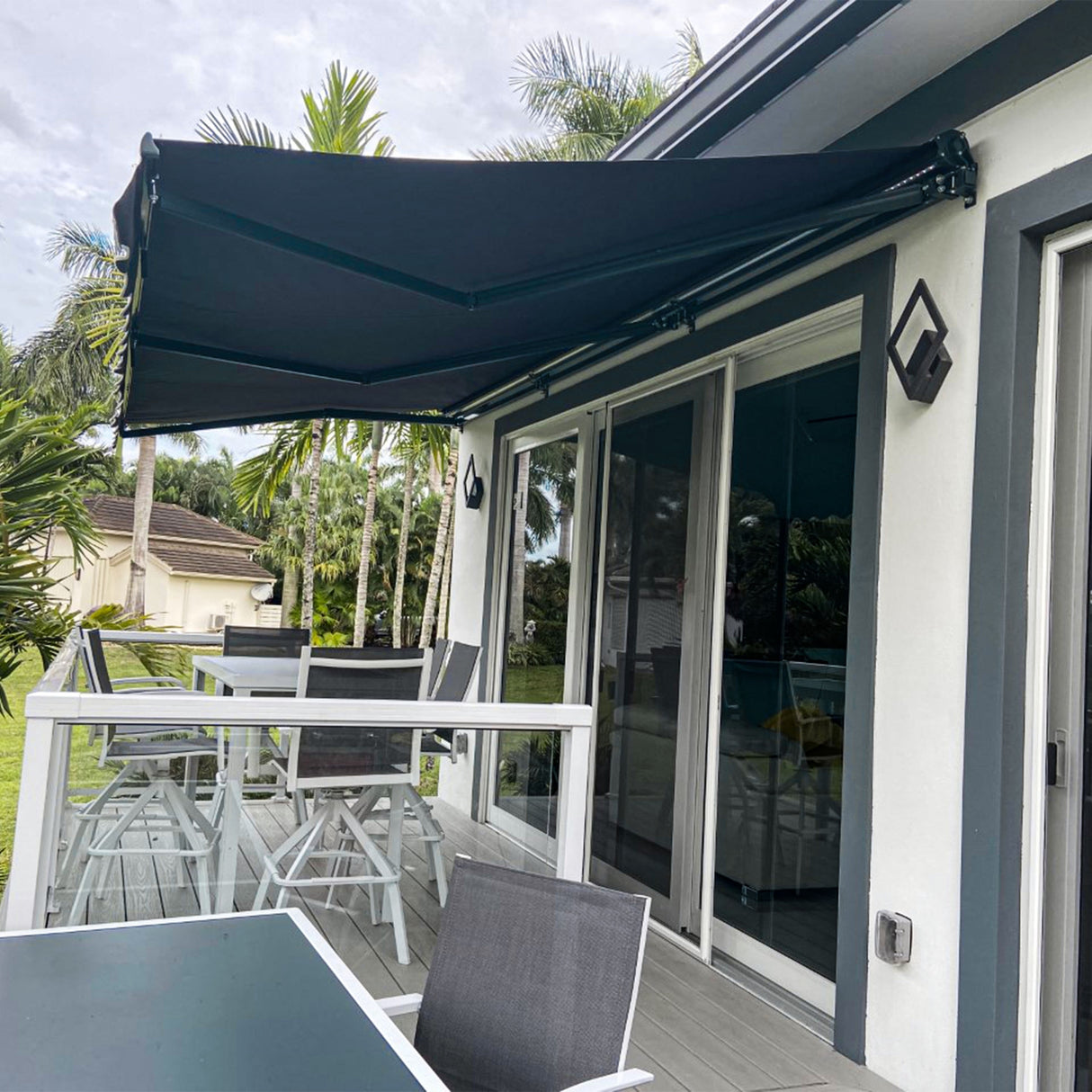 ALEKO Caribbean Motorized Retractable Patio Awning - Black Frame - Onyx Black - 20 x 10 Feet
