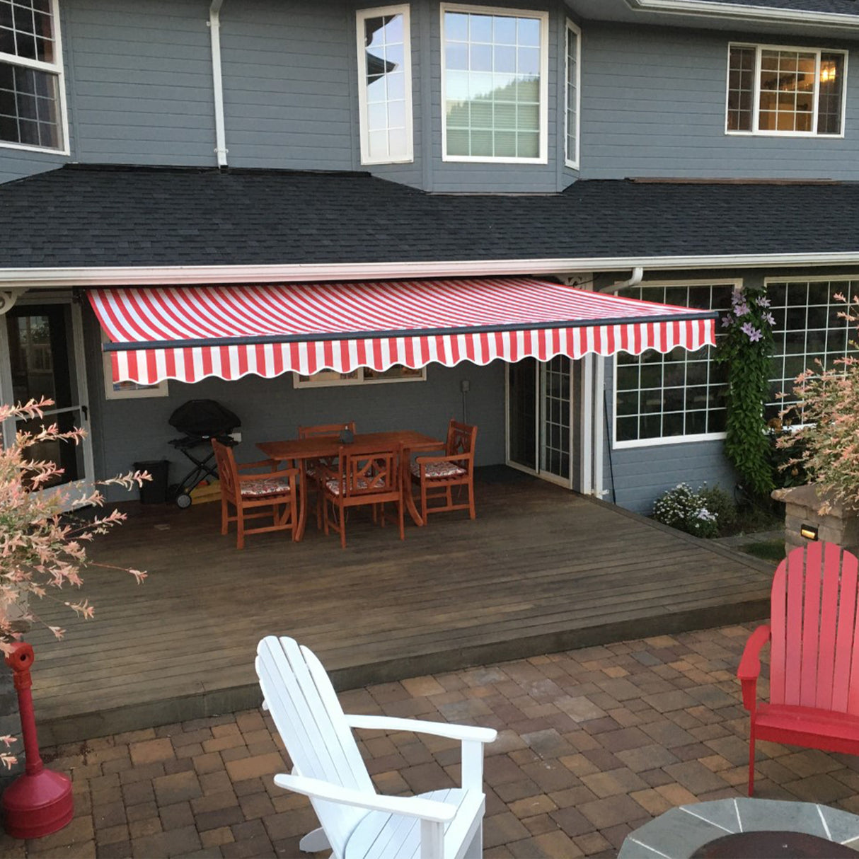 ALEKO Caribbean Motorized Retractable Patio Awning - Black Frame - Red & White Striped - 16 x 10 Feet