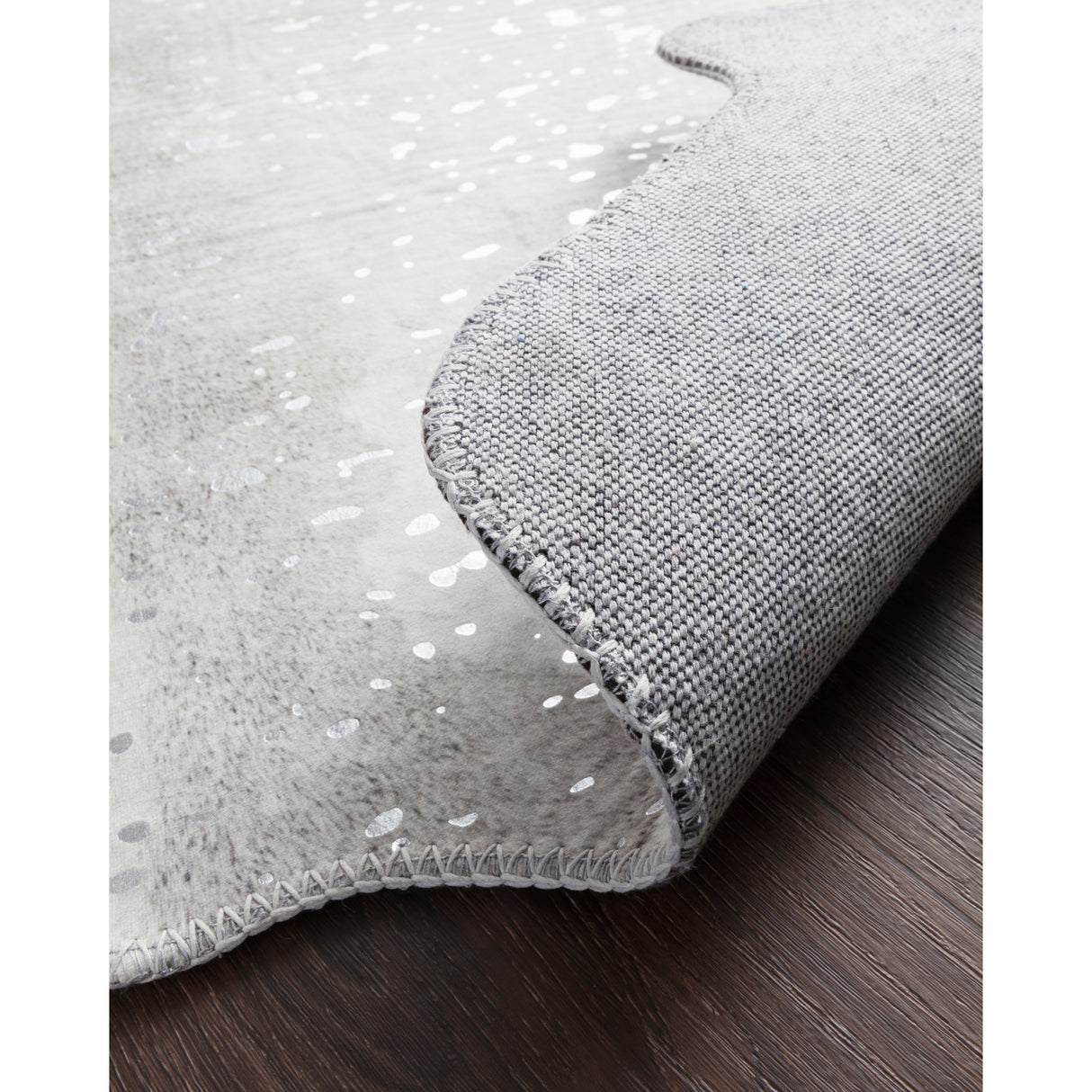 Alexander Home Lolitta Faux Cowhide Area Rug