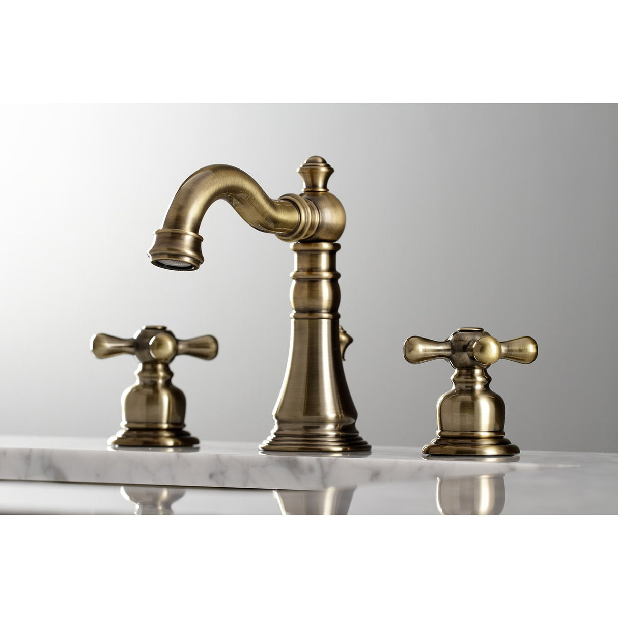 Kingston Brass American Classic Two-Handle 3-Hole Deck Mount Widespread Bathroom Faucet