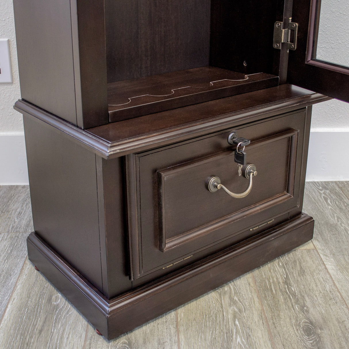 American Furniture Classics Model 650, 8 Gun Cabinet with locking tempered glass door and locking drop down door.