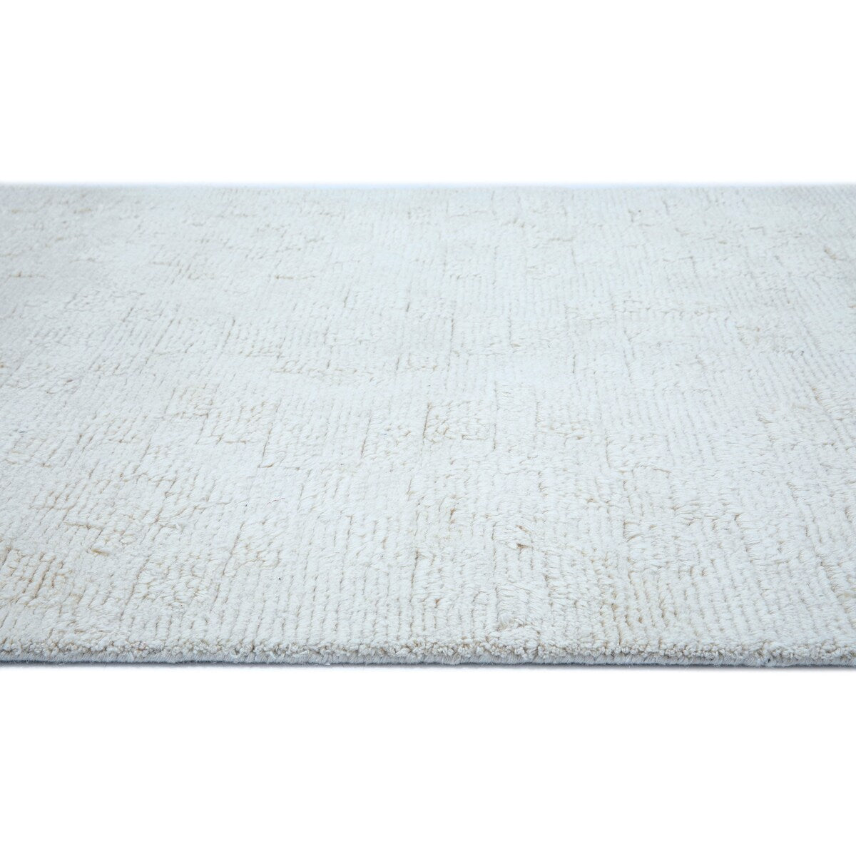 NuStory Barefoot Hand Tufted Solid Color Area Rug in Ivory Linen