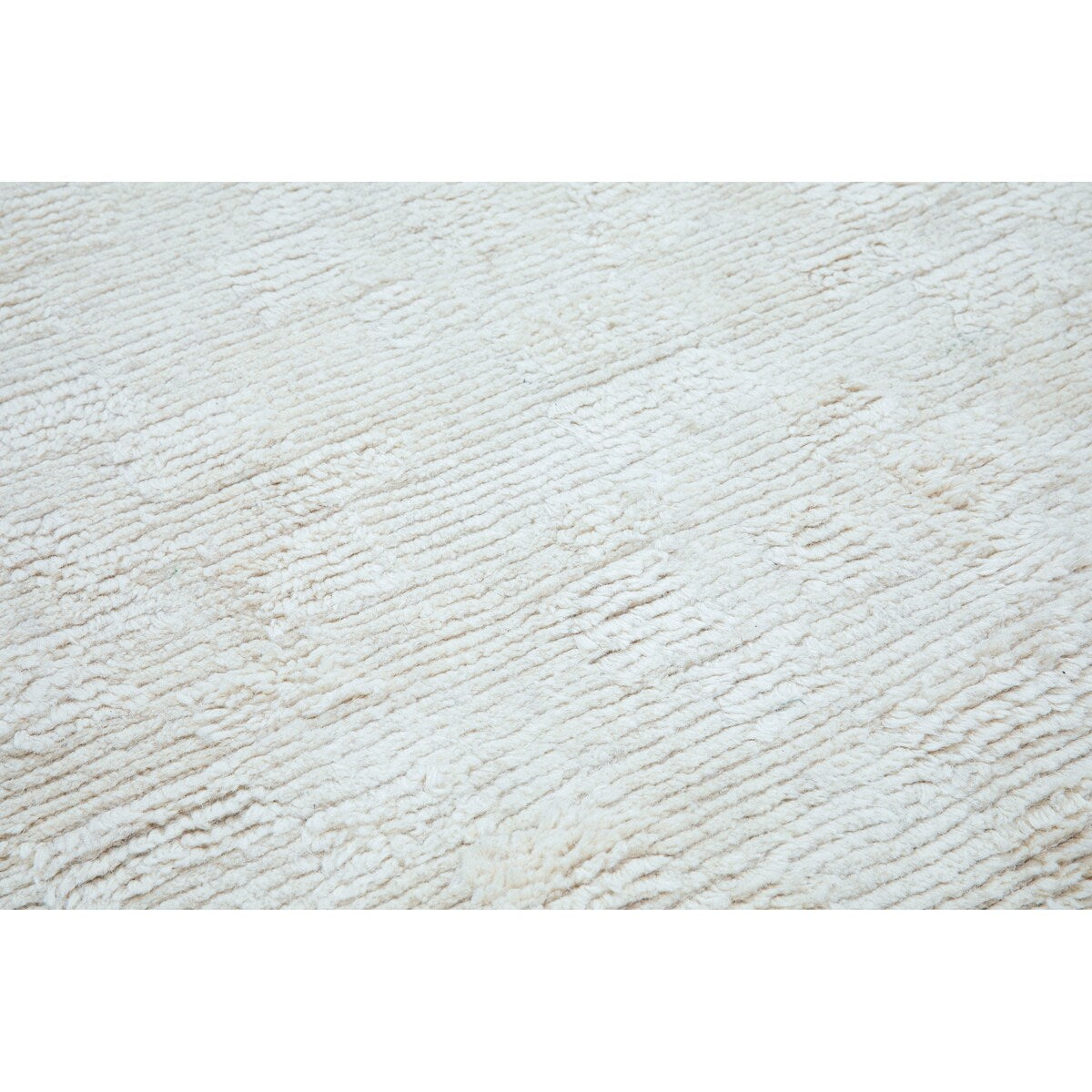NuStory Barefoot Hand Tufted Solid Color Area Rug in Ivory Linen