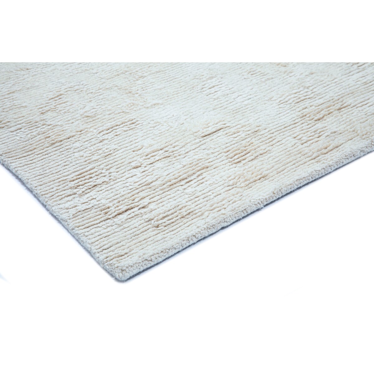 NuStory Barefoot Hand Tufted Solid Color Area Rug in Ivory Linen