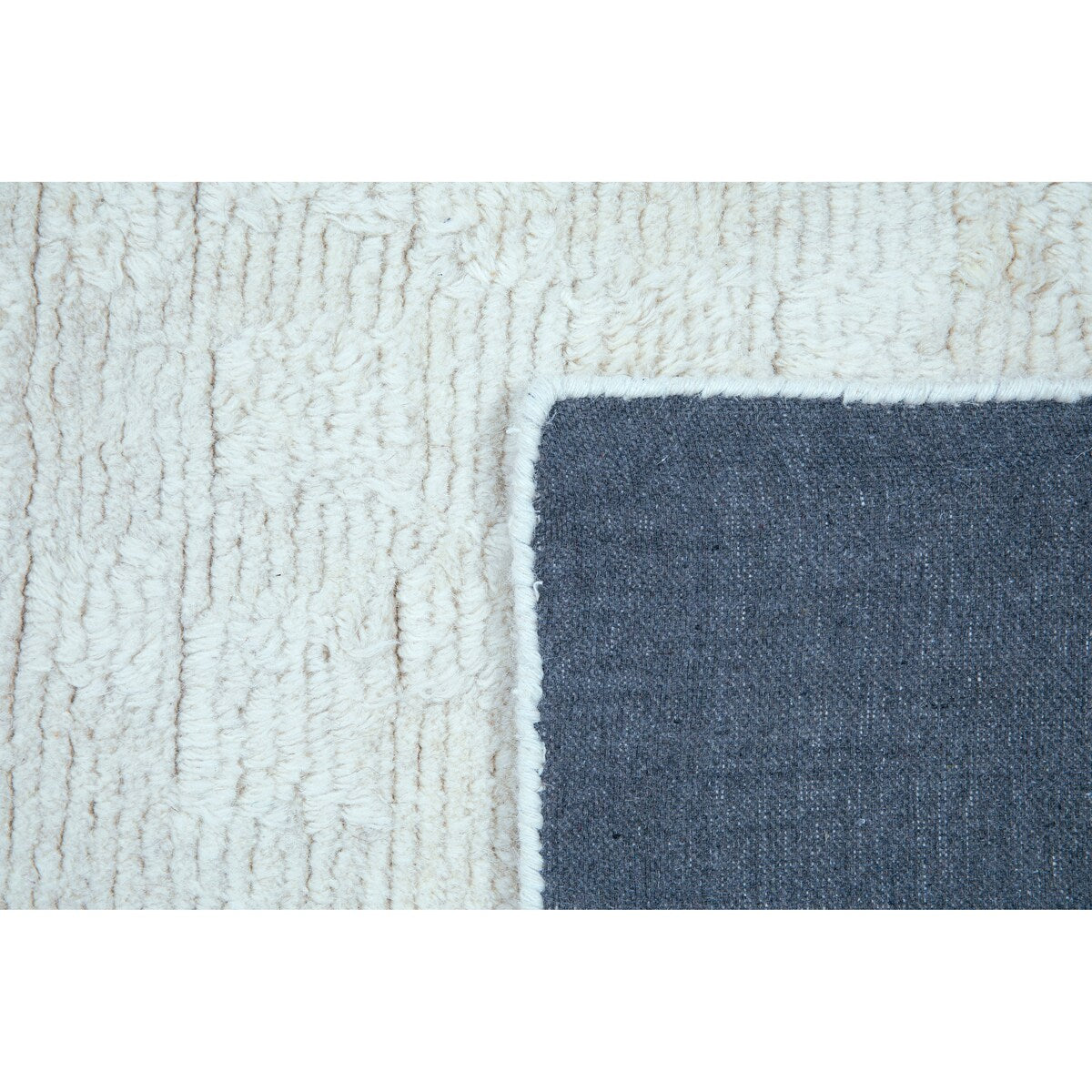 NuStory Barefoot Hand Tufted Solid Color Area Rug in Ivory Linen