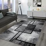 Black White Area Rug with Geometric Pattern and Modern Paint Effect