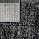 Black White Area Rug with Geometric Pattern and Modern Paint Effect