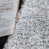 Black White Area Rug with Geometric Pattern and Modern Paint Effect
