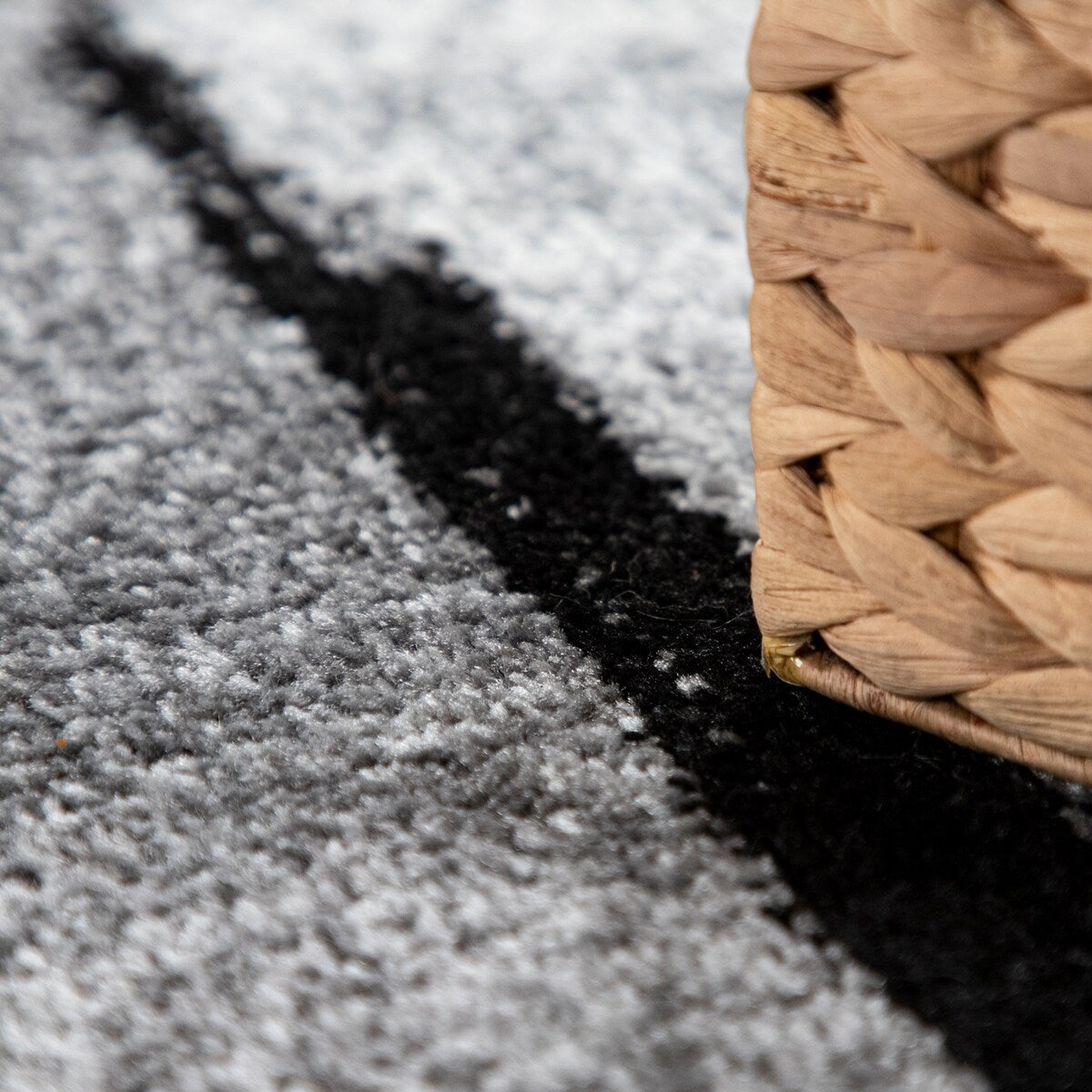 Black White Area Rug with Geometric Pattern and Modern Paint Effect
