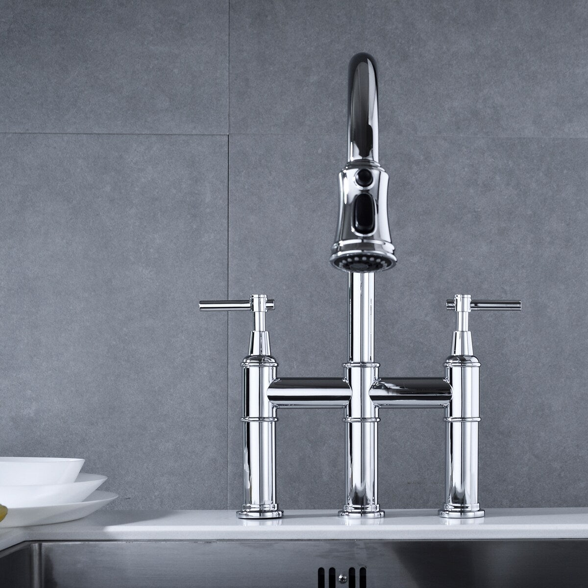 Bridge kitchen faucet with bridge pulldown spray