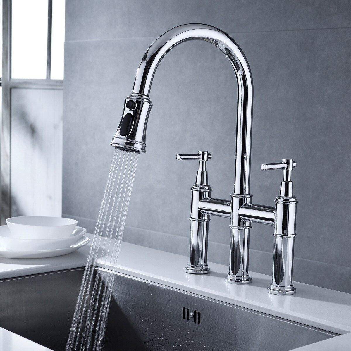 Bridge kitchen faucet with bridge pulldown spray