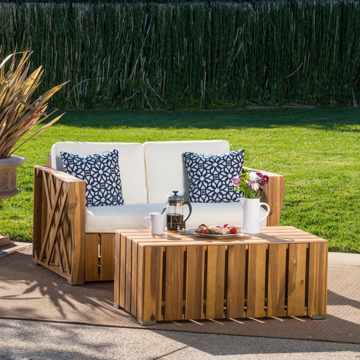 Cadence Outdoor 2-piece Acacia Wood Loveseat and Coffee Table Set with Cushions by Christopher Knight Home