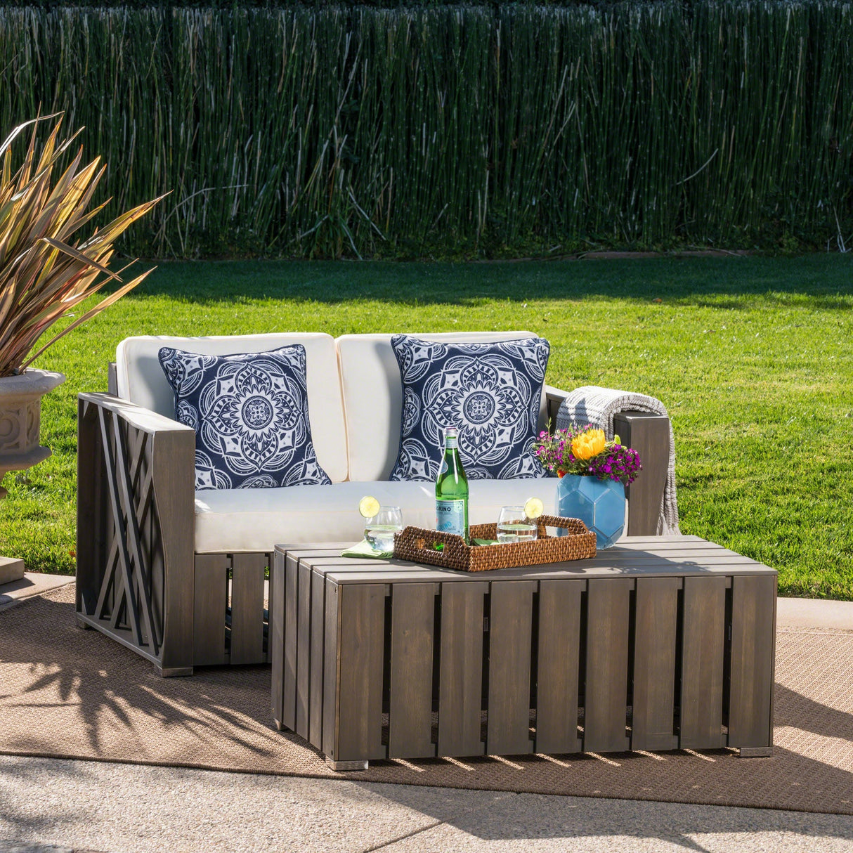 Cadence Outdoor 2-piece Acacia Wood Loveseat and Coffee Table Set with Cushions by Christopher Knight Home