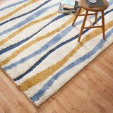 Carson Carrington Holstebro Blue/Gold Wavy Stripe Shag Area Rug
