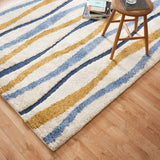 Carson Carrington Holstebro Blue/Gold Wavy Stripe Shag Area Rug