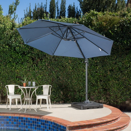 Puebla Outdoor 9.8-foot Canopy Umbrella with Base by Christopher Knight Home