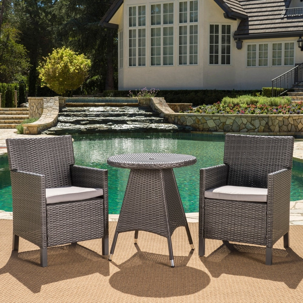 Cypress Outdoor 3-Piece Round Wicker Bistro Chat Set with Umbrella Hole & Cushions by Christopher Knight Home