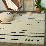 Dalmas Southwestern Stripe Shag Area Rug