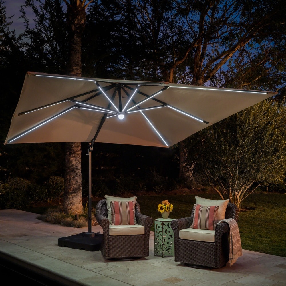 Delray Outdoor 9.7 ft. Canopy Umbrella with Base and Solar Light Strip by Christopher Knight Home