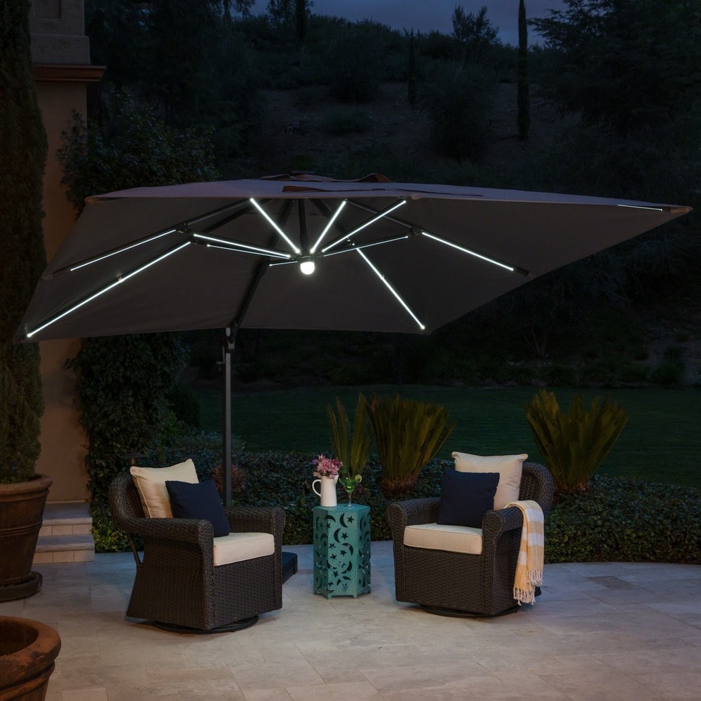 Delray Outdoor 9.7 ft. Canopy Umbrella with Base and Solar Light Strip by Christopher Knight Home